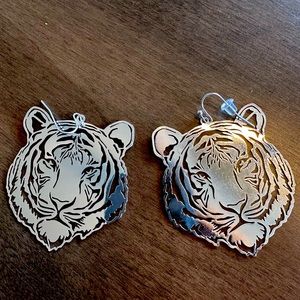 Silver tiger cut out earrings